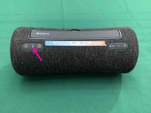 Picture of the -Pairing- button, one to the right of the Power button.