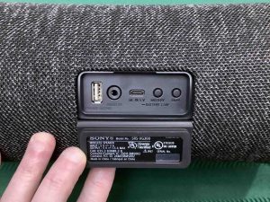 Picture of the port door held open on the back of the XG300.