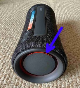 Picture of the party lights glowing red on the Sony SRS XG300 speaker right end.