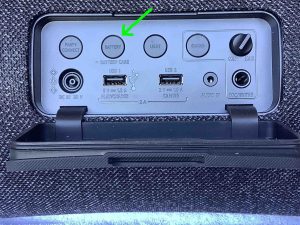 Picture of the -Battery- button on the back.