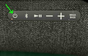 Picture of the -Power- button on the Sony SRS XG500 speaker.