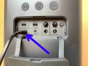 Picture of the power cord inserted into the Sony SRS XP500 speaker.
