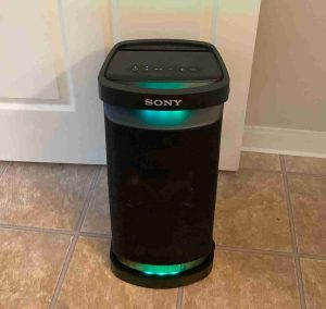 Picture of the front of the Sony SRS XP500 with its party lights ON.