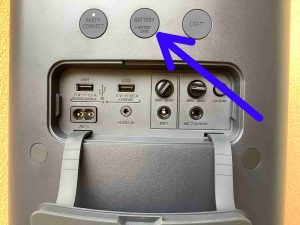 Picture of the -Battery-Battery Care- button on the back of the speaker. Battery Care can lengthen battery life on the Sony SRS XP500.